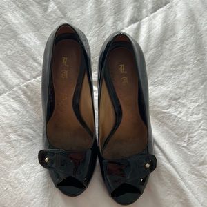 L.A.M.B. black patent leather pumps